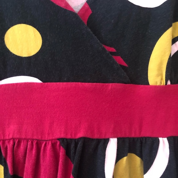 Black, v-neck dress with circle design and 3/4 length sleeve - Picture 3 of 6